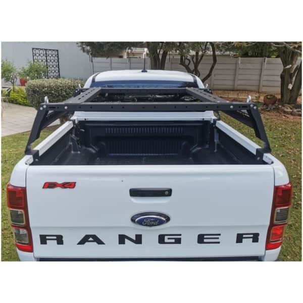 1. Vehicle bed organizer installation for Ford Ranger 4x4 pickup.